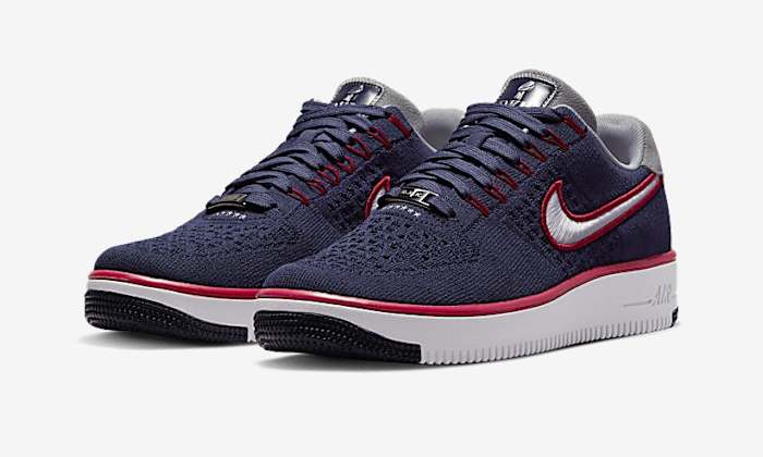 Blue, white, and red Nike Air Force 1 shoes.